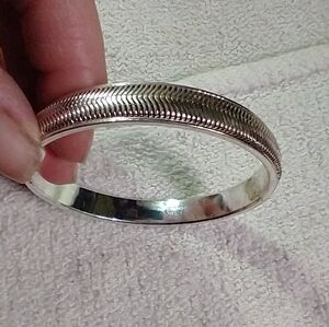 Silvertone textured bangle bracelet
